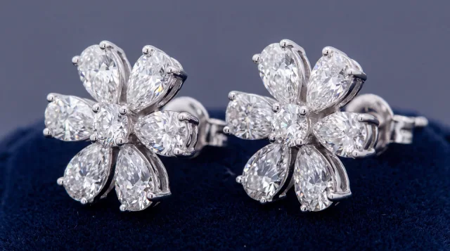 Custom flower earrings made with pear cut stones